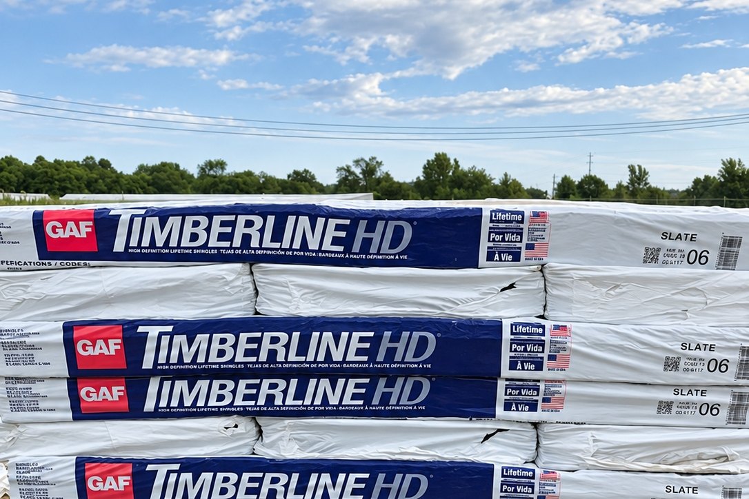 Pallets of GAF Timberline HD architectural shingles in the yard