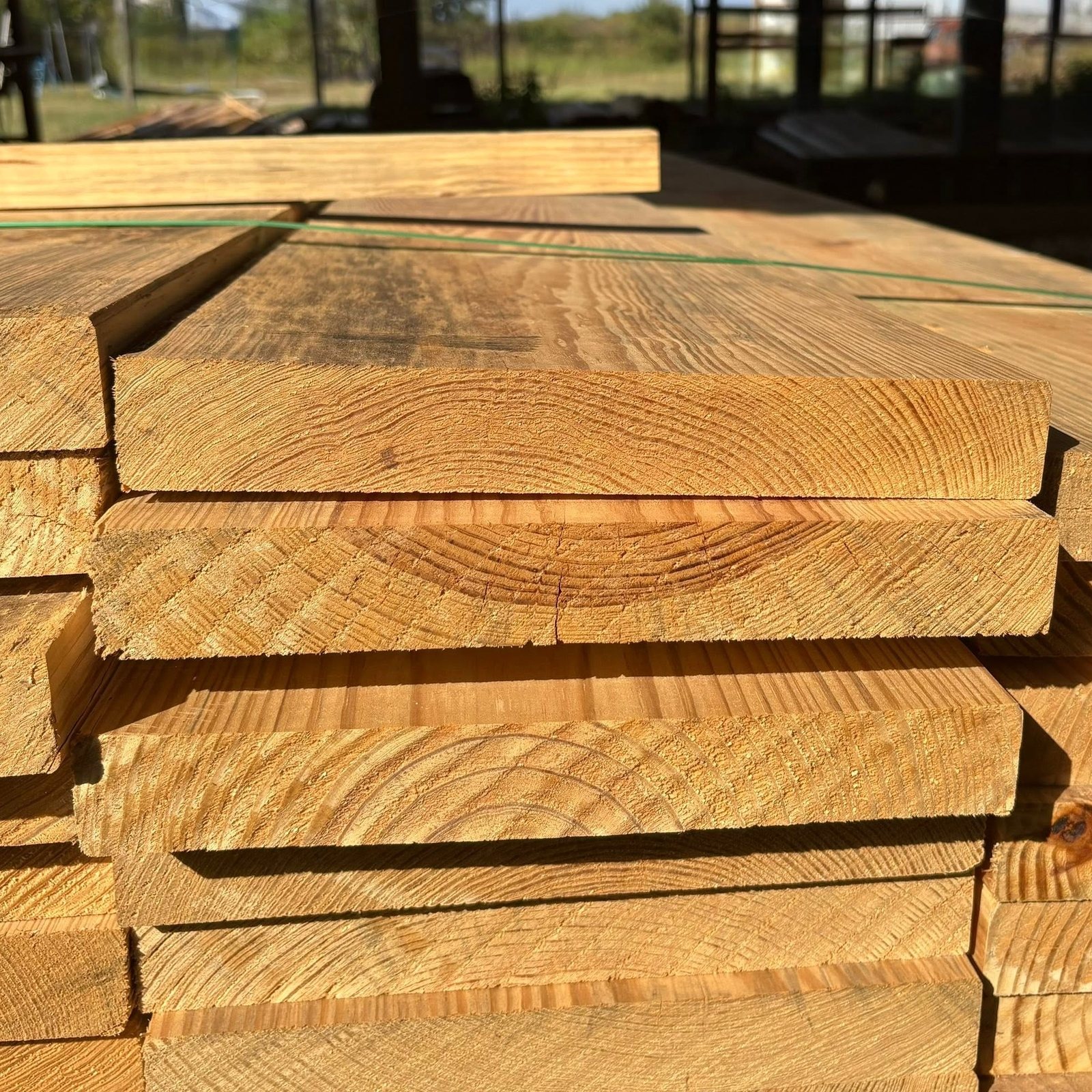 Stacked dimensional lumber in the Green Country yard